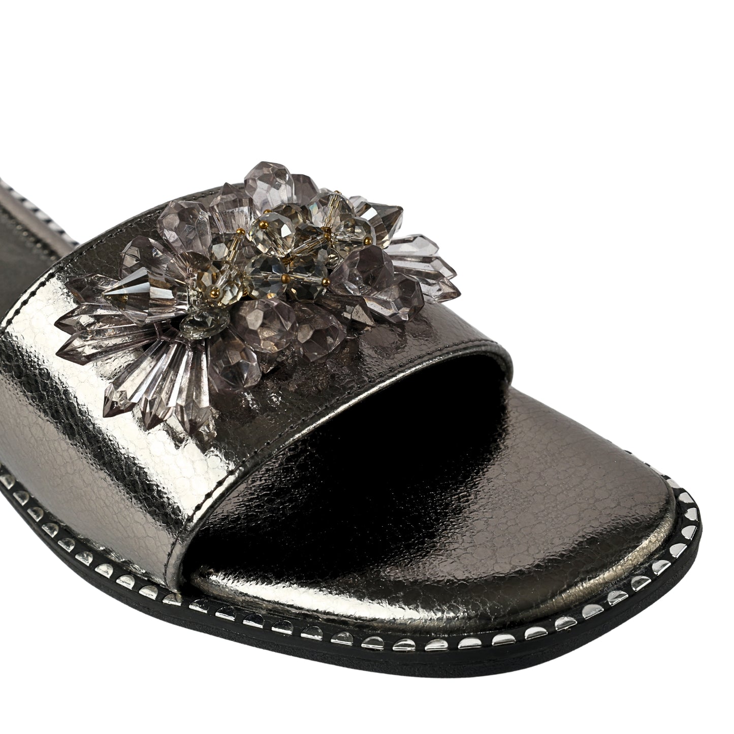 Grey Mirage Flat Sliders front close-up — crystal and faceted bead floral brooch on gunmetal metallic strap with silver studded sole trim by Solemates by Palak