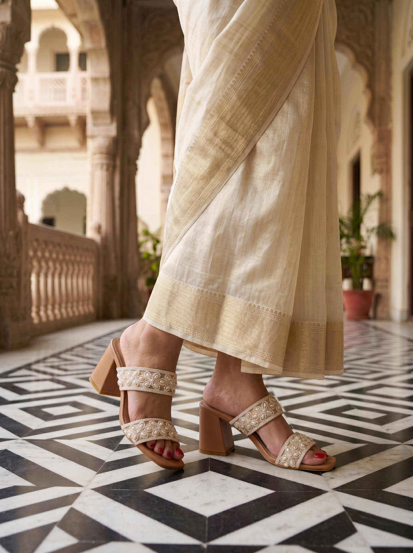 Grace Pearl Embellished Block Heels worn at heritage location — tan block heel with double pearl strap by Solemates by Palak