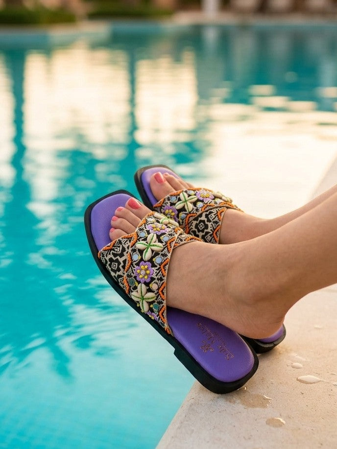 Malibu Criss Cross Flat Sliders worn at poolside — cowrie shell and mirror work embellished boho flats by Solemates by Palak