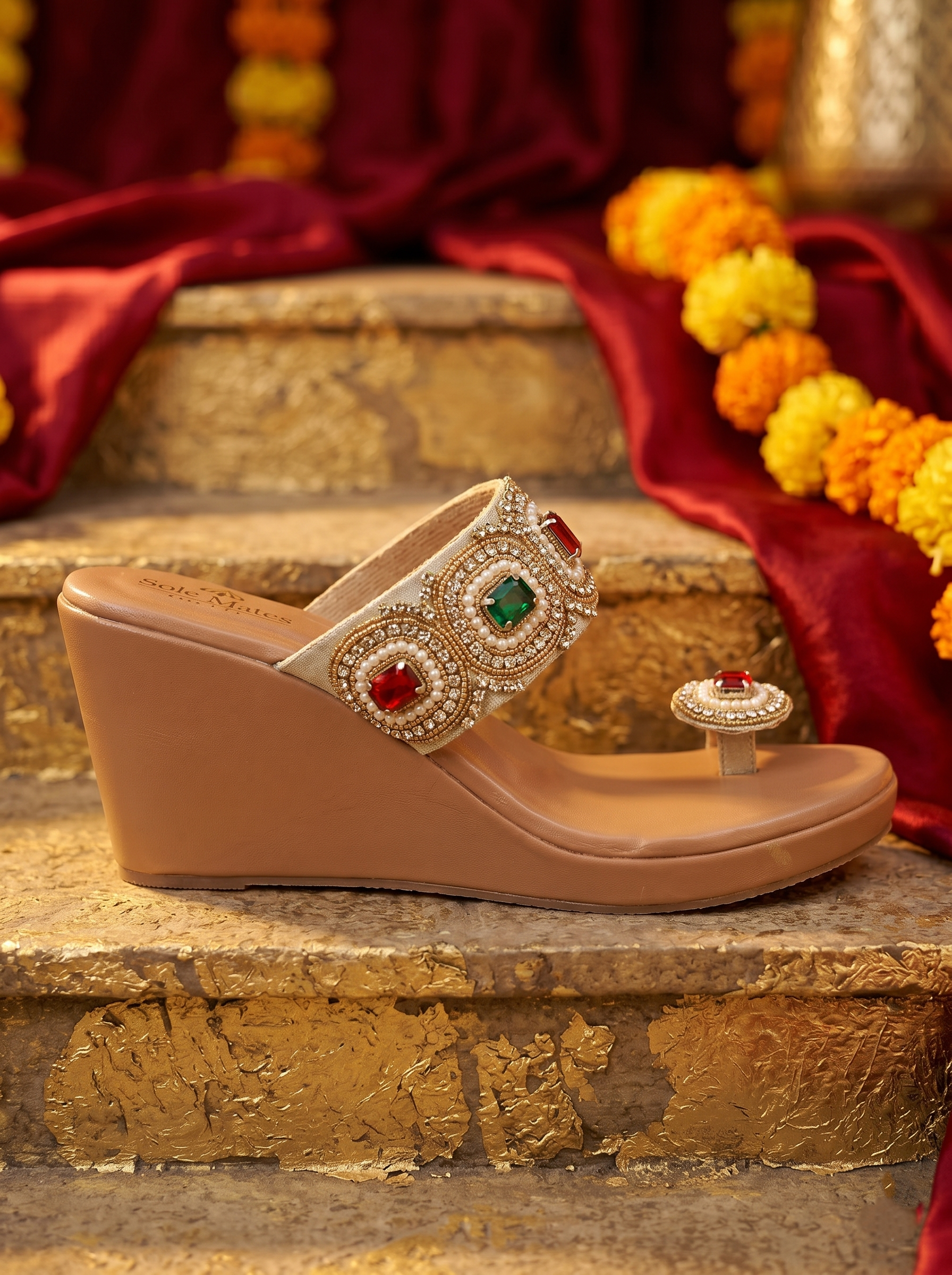 Rang Manch Kolhapuri Heels side profile on stone steps — cream strap with ruby and emerald stone circular motifs and pearl bead detailing by Solemates by Palak