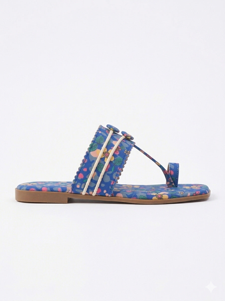 Blue Lagoon Kolhapuri Flats side profile white background — blue floral print kolhapuri flat with fabric button, rope cord and scalloped strap detail by Solemates by Palak
